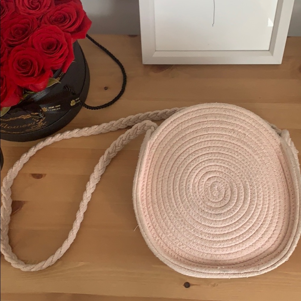 urban outfitters pink woven shoulder bag